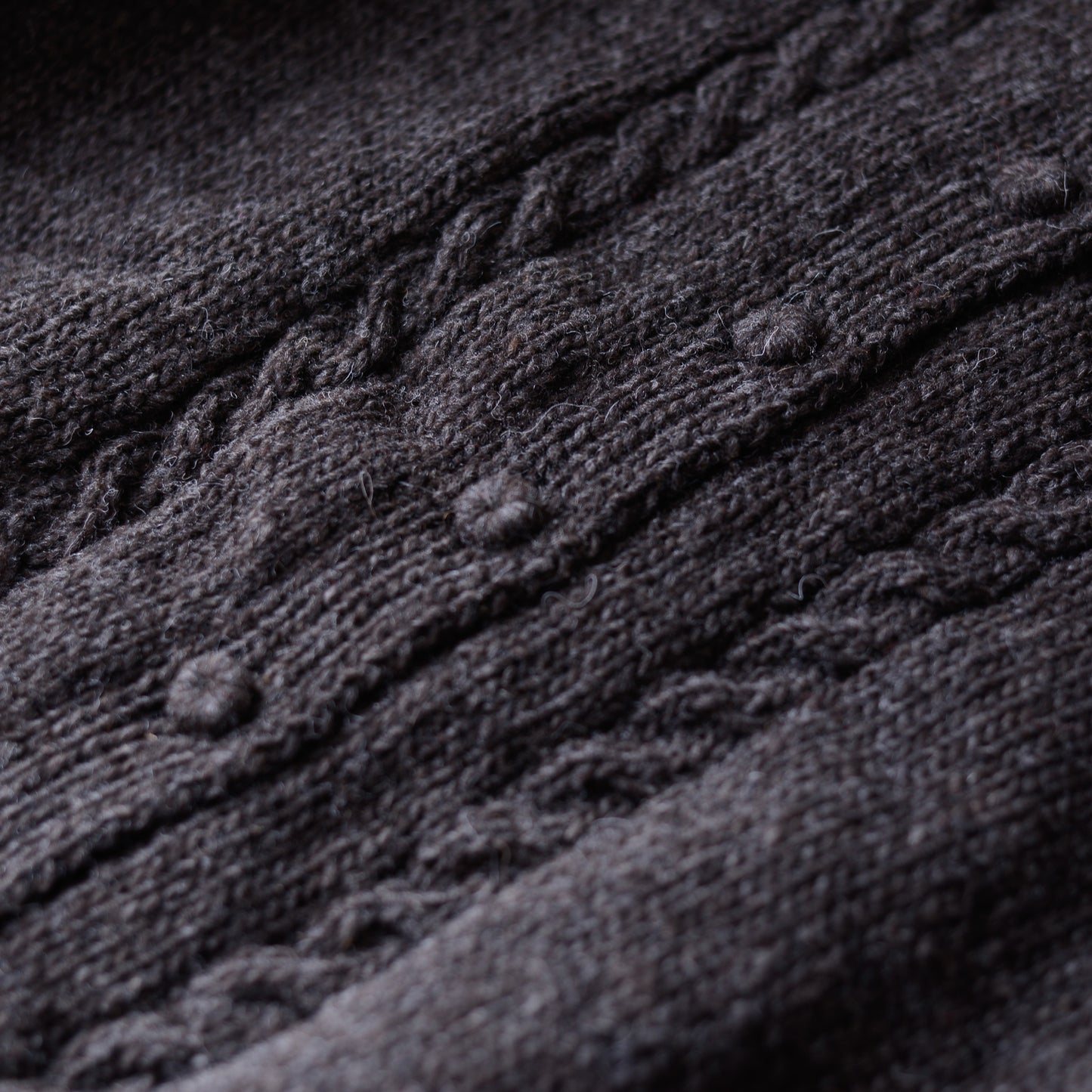 Wool hand knitted cable cardigan in brown