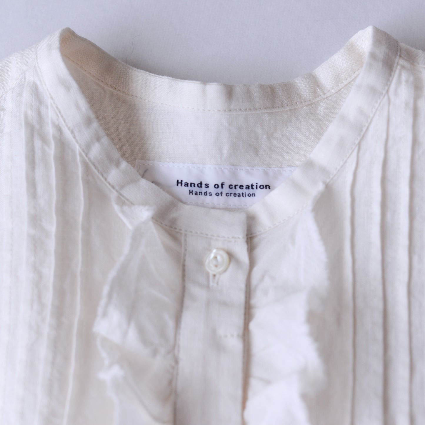 リネンラミータックフリルブラウス Off White