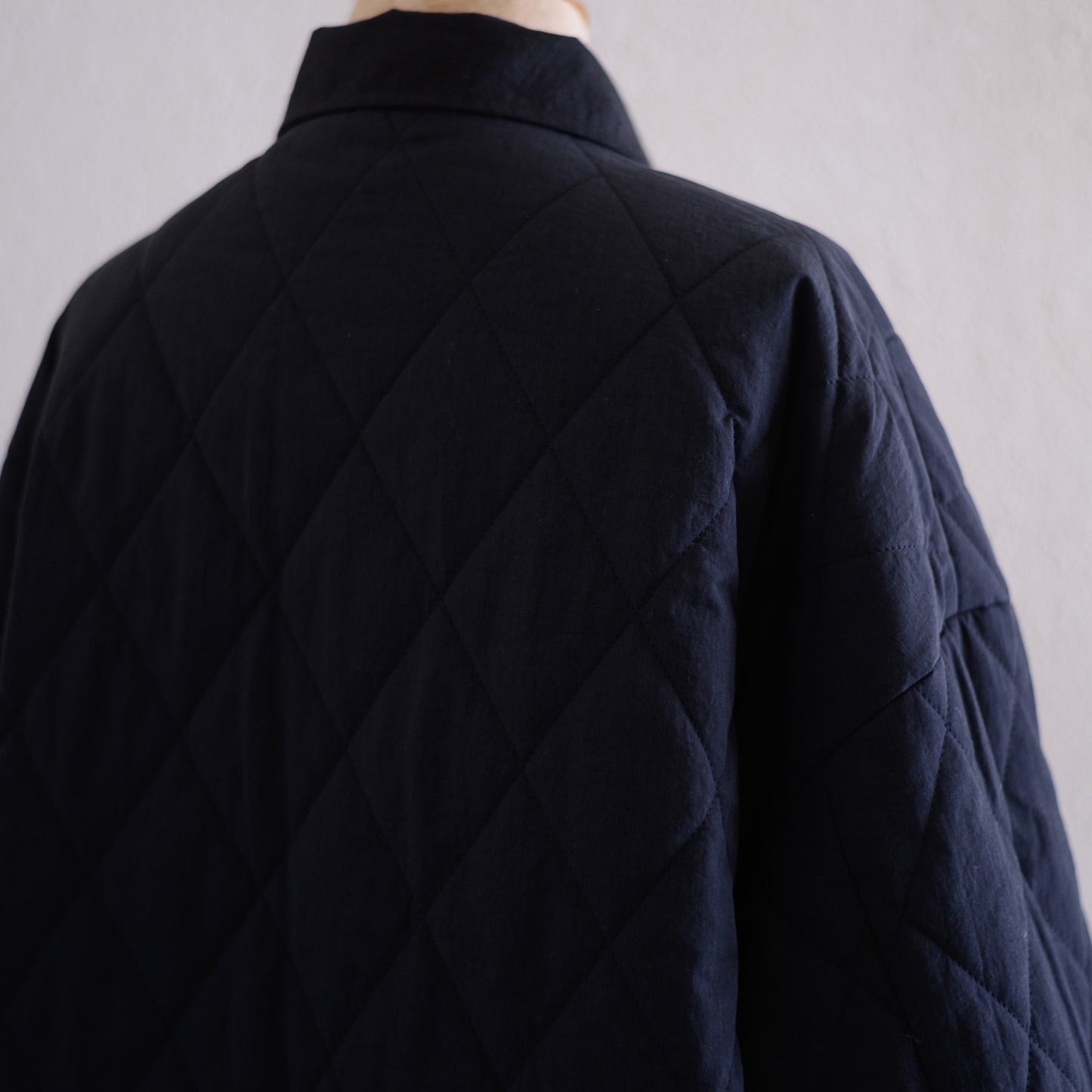 コットンキルトリバーシブルロングコート Black